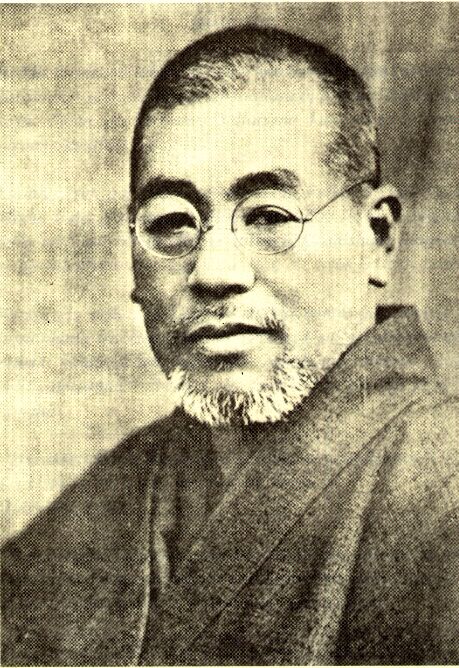 Historical black-and-white portrait of Mikao Usui, founder of Usui Reiki